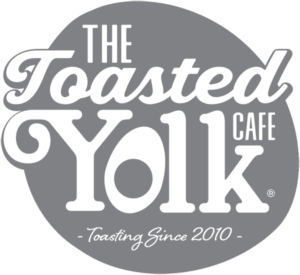 The Toasted Yolk Cafe logo